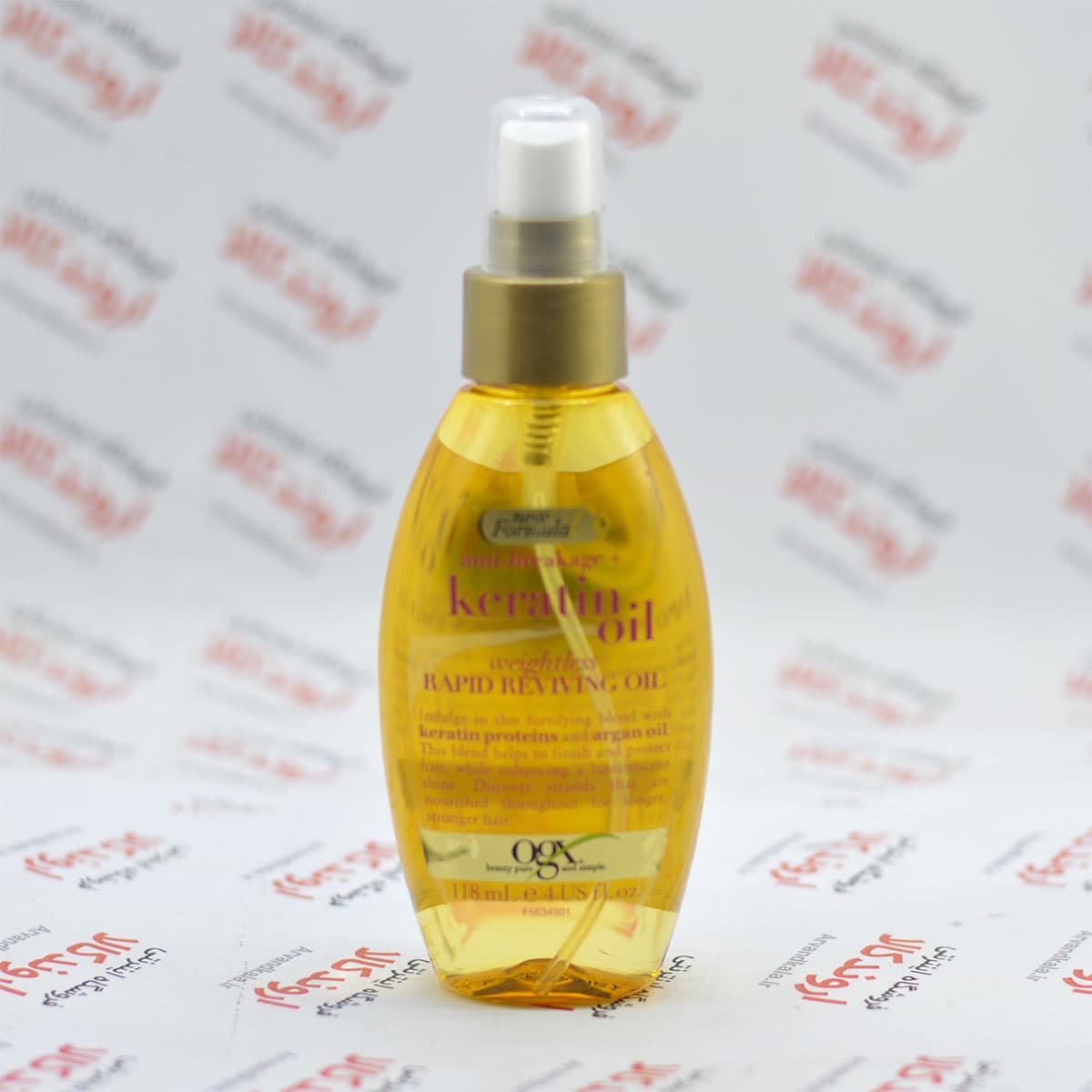 روغن مو او جی ایکس Ogx مدل Keratin