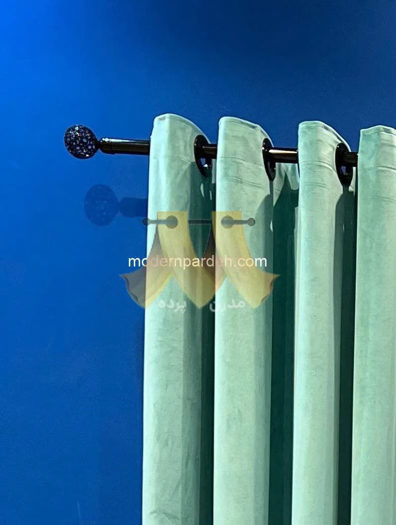 پرده آماده پانچی مخمل ساده آبی فیروزه ای — تصویر ۲