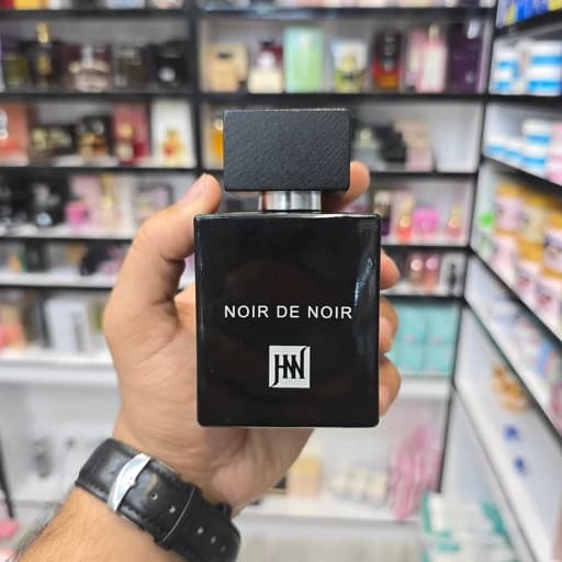 عطر ادکلن لالیک مشکی در چوبی انکر نویر مردانه و زنانه 100 میل برند شرکتی جانوین رایحه گرم و تلخ و چوب سوخته — تصویر ۴