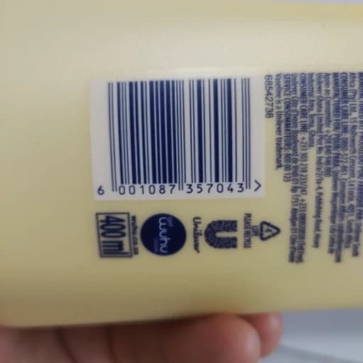 لوسیون بدن ترمیمکننده جوی دوسر وازلین Vaseline Dry Skin Repair حجم 400 میلیلیتر — تصویر ۳