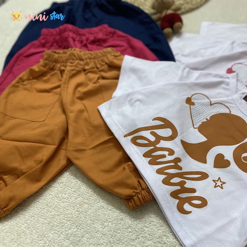کراپ شلوارک کتان کش دخترانه مدل باربی 2 تا 9 سال — تصویر ۳