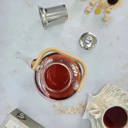 قوری پیرکس دسته بامبو صافی و درب استیل — تصویر ۴