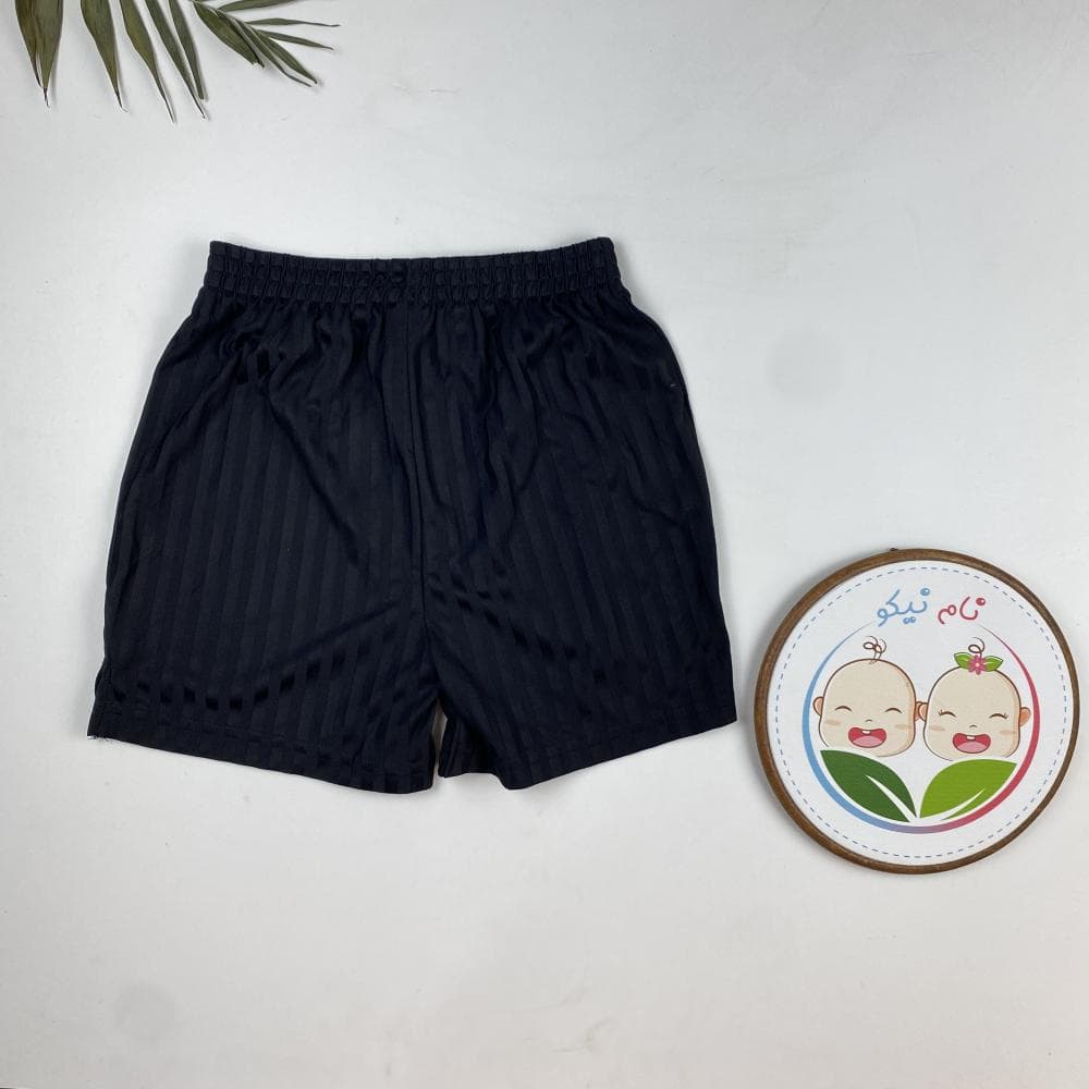 شلوارک دخترانه برند Tu طرح راه راه کمر کش مشکی رنگ – 9 سال