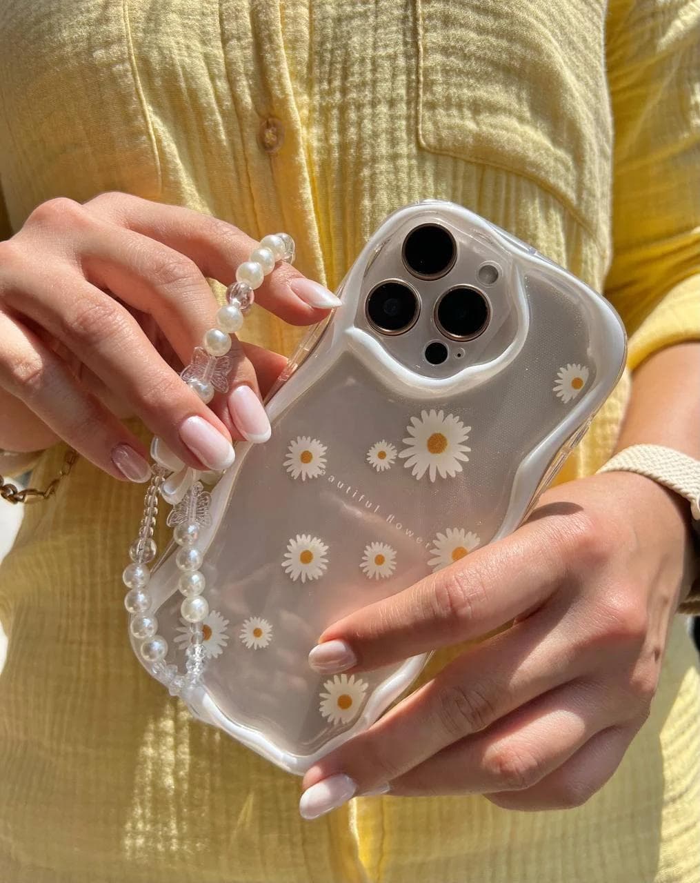 قاب شفاف طرح گل بابونه 🌼 با بند ست گوشی آیفون 13 پرو — تصویر ۵