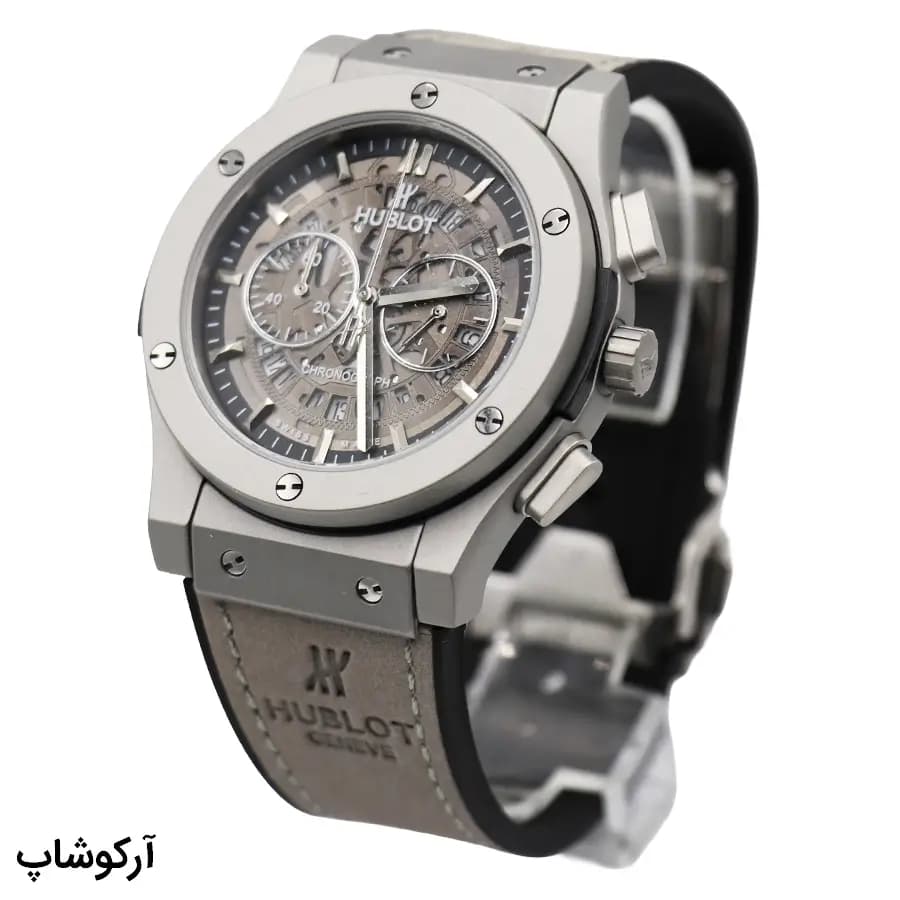 ساعت Hublot بیگ بنگ اسکلتون کرنوگراف خاکستری، بند جیر و سیلیکونی، قاب نقرهای مات، صفحه گرد اسکلتون شفاف با نمایش چرخدندهها و قفل پروانهای مدل 582888 — تصویر ۲