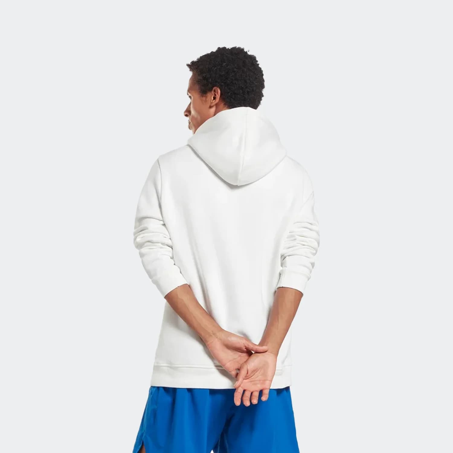 هودی مردانه ریباک مدل Identity Stacked Logo Sweatshirt — تصویر ۳