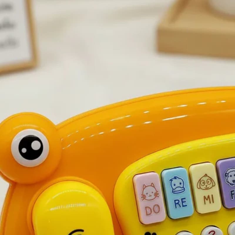 اسباب بازی ناب سل مدل تلفن قورباغه موزیکال toy telephone music — تصویر ۵