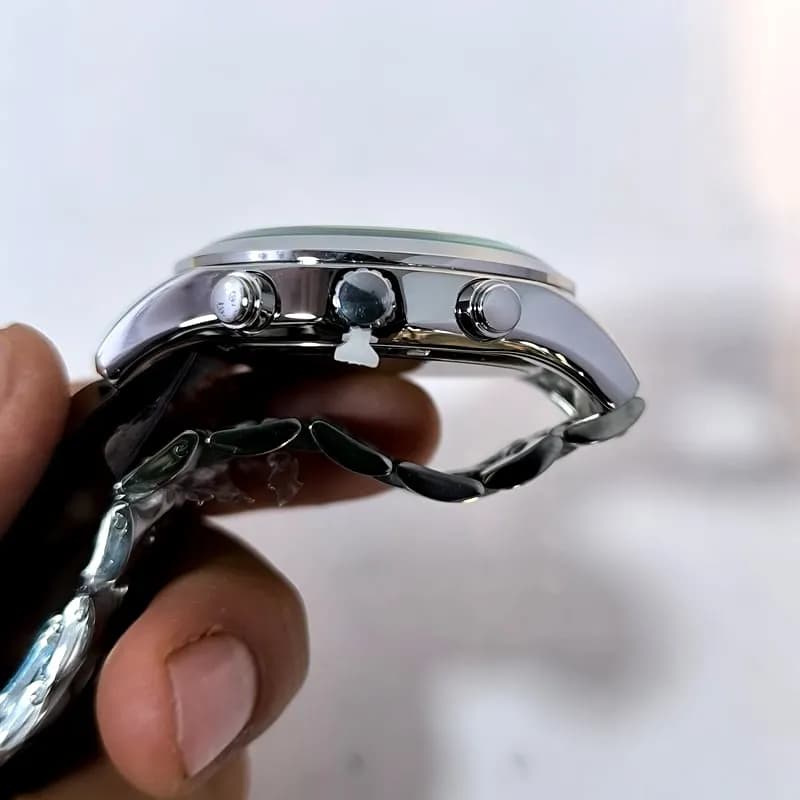 ساعت مردانه رومانسون والنتینو – موتور ژاپن – تاریخ دار – طرح سه موتور – 4000 — تصویر ۳