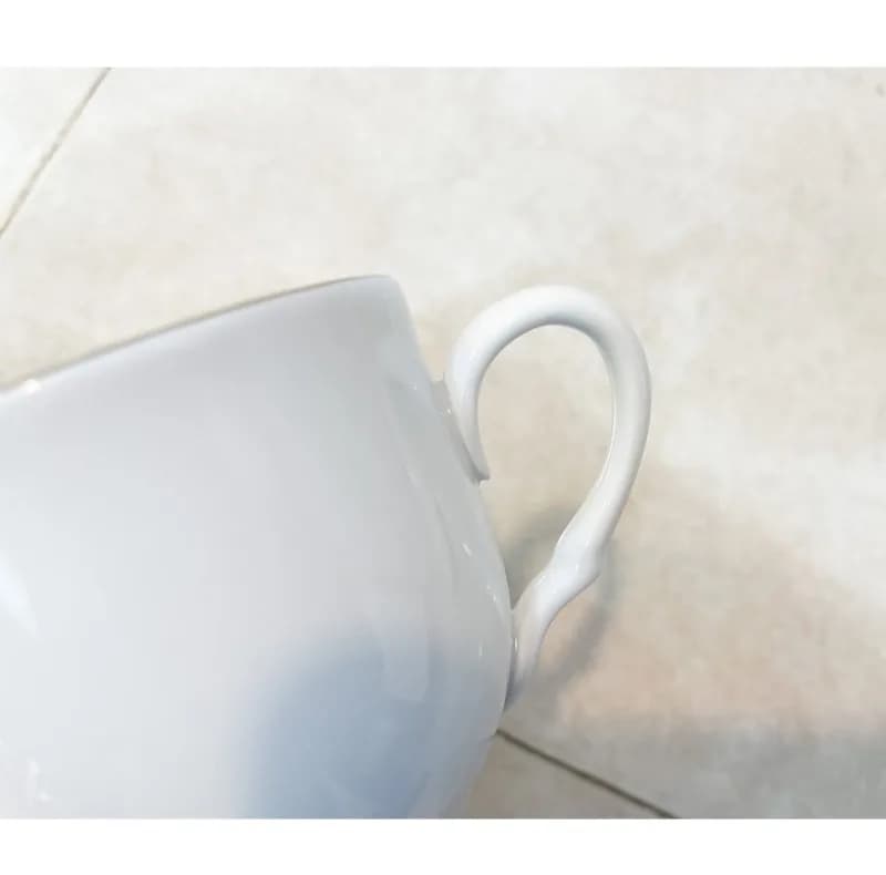 سرویس چای خوری 12 پارچه شرکت صنایع چینی تقدیس مدل لب طلا — تصویر ۴