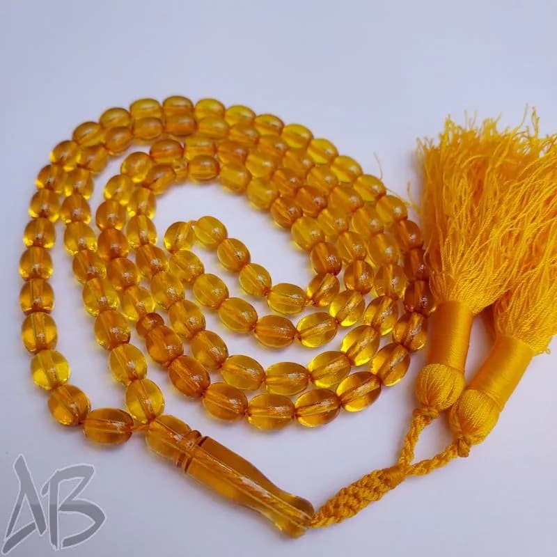 تسبیح سندلوس صد دانه (101 دانه) زردبودار تراش تخم مرغی سندانی کد 884 آقابزرگ — تصویر ۶