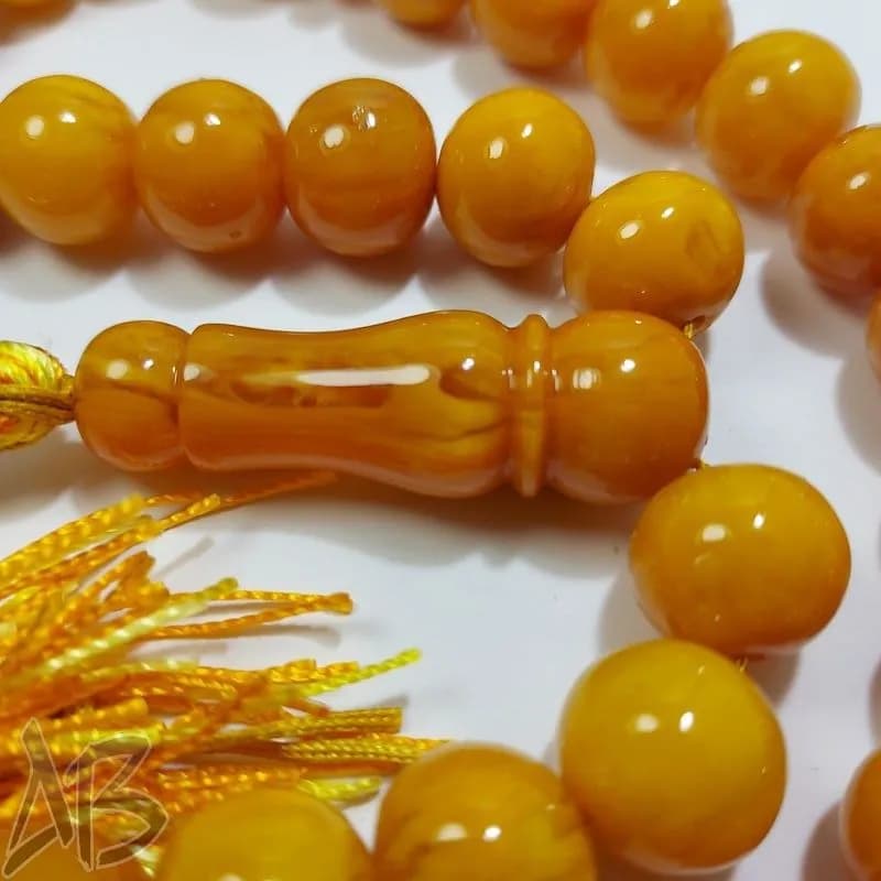 تسبیح سندلوس 33 دانه بودار تراش شلغمی زرد کهربایی و خوش تراش کد 829 آقابزرگ — تصویر ۴
