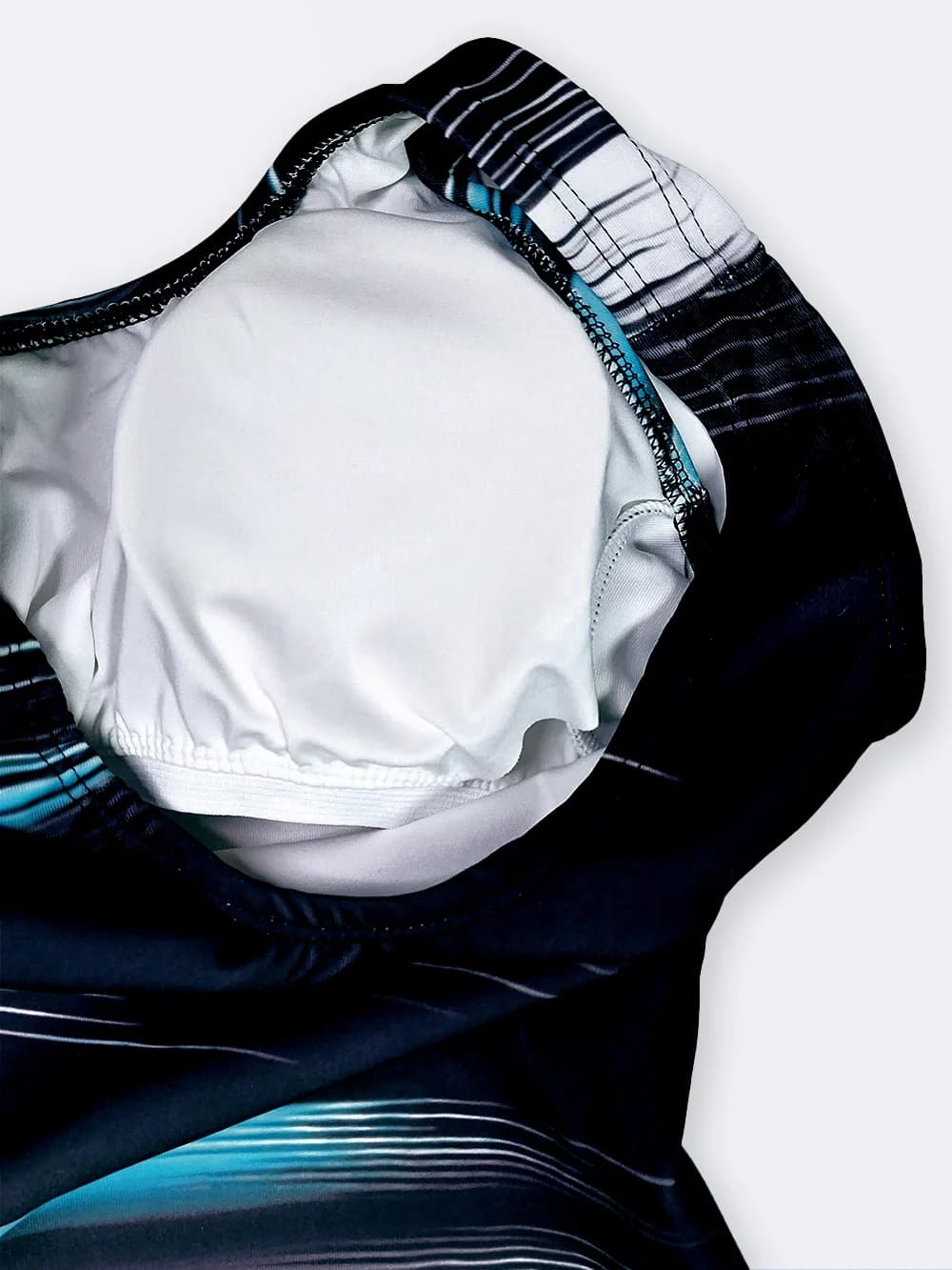 مایو نیمه پوشیده زنانه پادار و کاپدار برای استخر اسپیدو ( Speedo ) با خطوط فیروزه ای — تصویر ۷