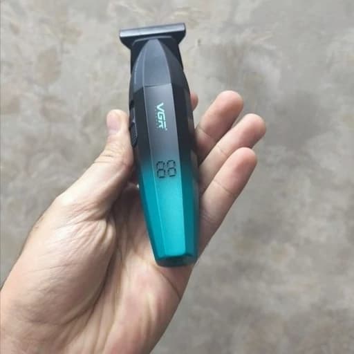 ماشین اصلاح موی سر و صورت وی جی آر مدل V-906 با تیغه سرامیکی پوشش DLC، موتور 9000 دور در دقیقه، باتری 2000 میلی آمپر ساع — تصویر ۸