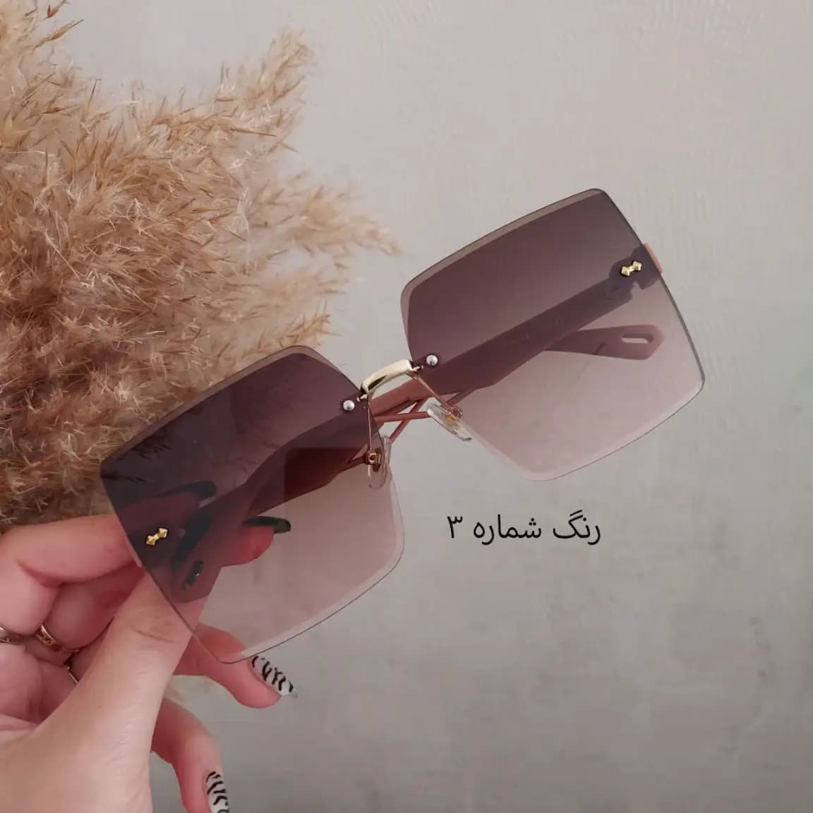 عینک آفتابی زنانه طرح جدید فریم لس مربعی | عینک آفتابی فشن لاکچری با UV400 و کیف زیپدار — تصویر ۴