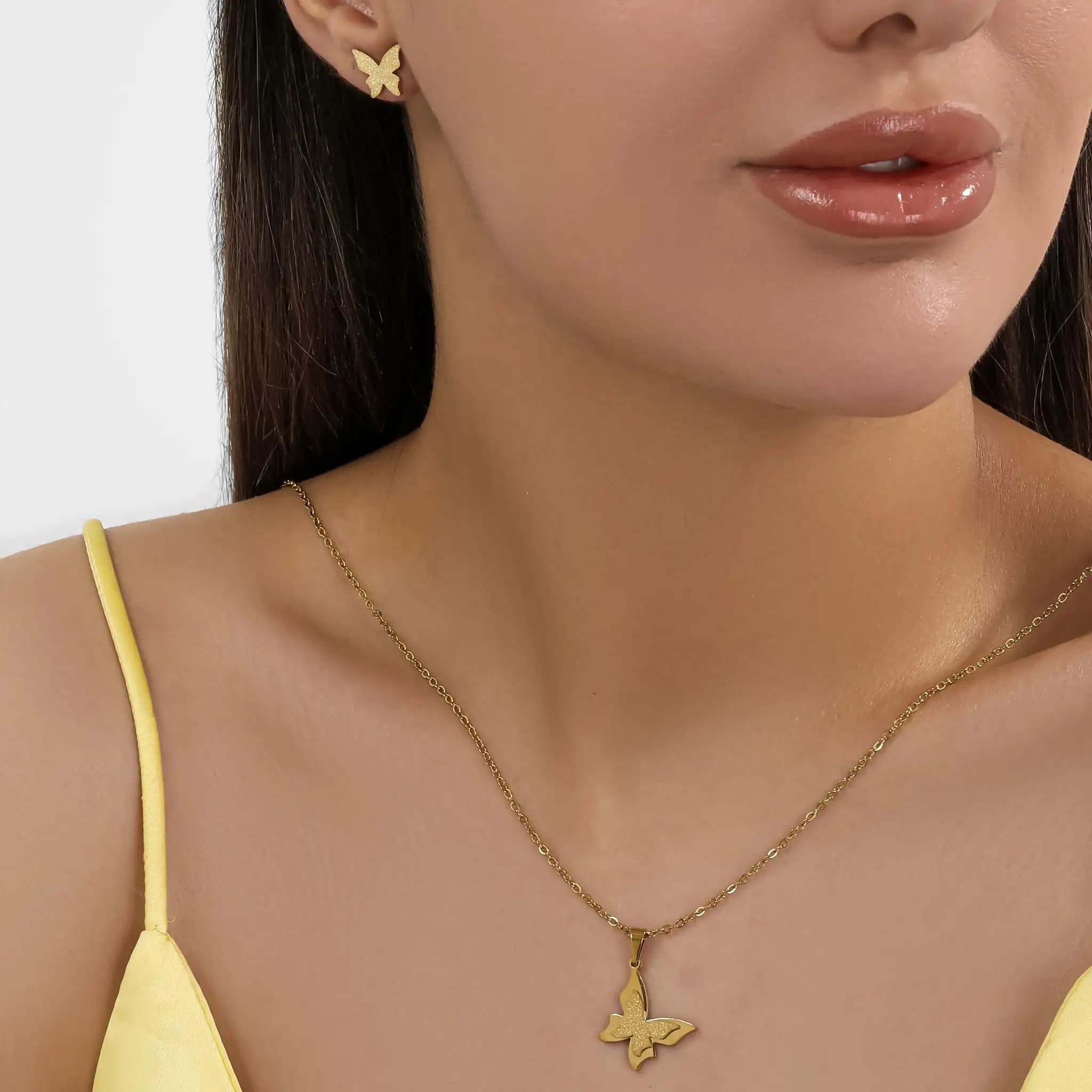 نیم ست زنانه و دخترانه گردنبند و گوشواره استیل طرح پروانه ای ضد حساسیت رنگ کاملا ثابت کد amp — تصویر ۴