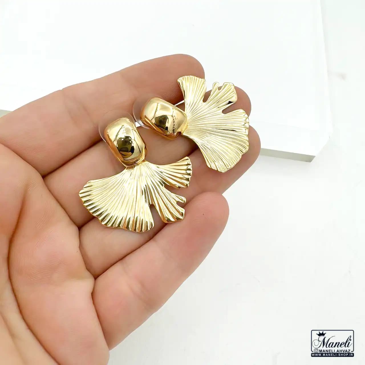 گوشواره طرح صدف طلایی و نقره ای | استیل | رنگ ثابت 14030572 — تصویر ۳