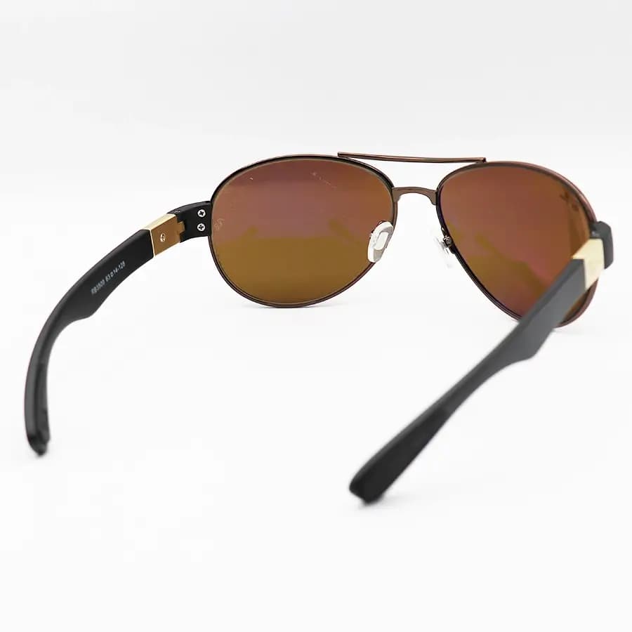 عینک آفتابی Ray-Ban با فریم شکل خلبانی، رنگ مسی، عدسی شیشهای و قهوهای تیره مدل RB3509 — تصویر ۳