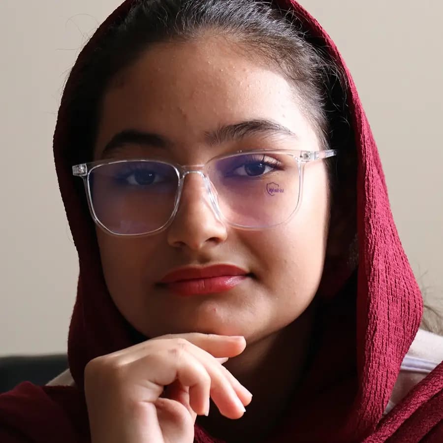 عینک با فریم بنفش رنگ، شکل مربعی، از جنس کائوچو و لنز بلوکات مدل 20355 — تصویر ۲