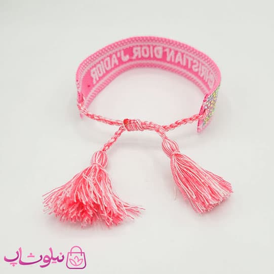 دستبند دخترانه پارچه ای کریستین دیور نگیندار صورتی سفید کد 145 — تصویر ۲