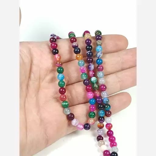 تسبیح عقیق ماداگاسکار رنگی 100 دانه سنگی سایز 6 | تسبیح سنگی | سنگ طبیعی | تسبیح مذهبی | تسبیح مالاکیت | تسبیح لاجورد | تسبیح یاقوت | تسبیح کلکسیونی عتیقه و آنتیک | تسبیح زینتی | تسبیح کهر — تصویر ۲