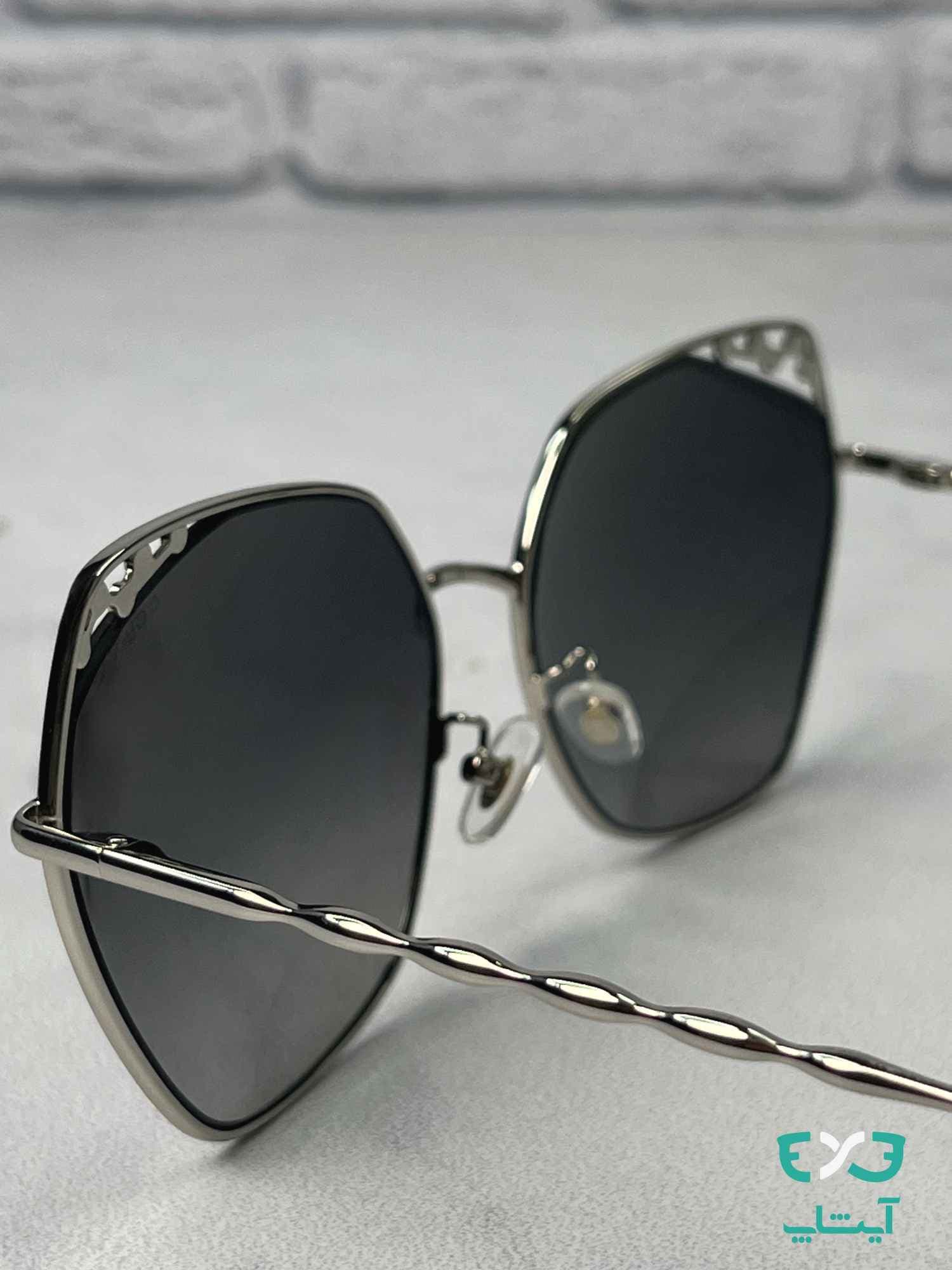 عینک آفتابی شنل CHANEL کد CH8303 مشکی نقره ای — تصویر ۳