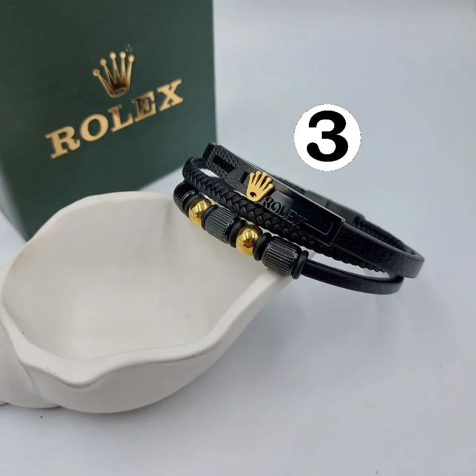 دستبند چرمی رولکس rolex مردانه قفل مگنتی کلاسیک رنگ طلایی و نقره ای کد zmp 246586 — تصویر ۲