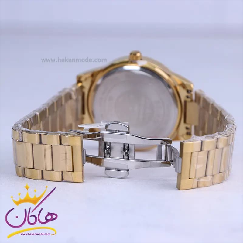 ساعت مچی سیکو مردانه فلزی طلایی صفحه سرمه ای OS 9/44 — تصویر ۲