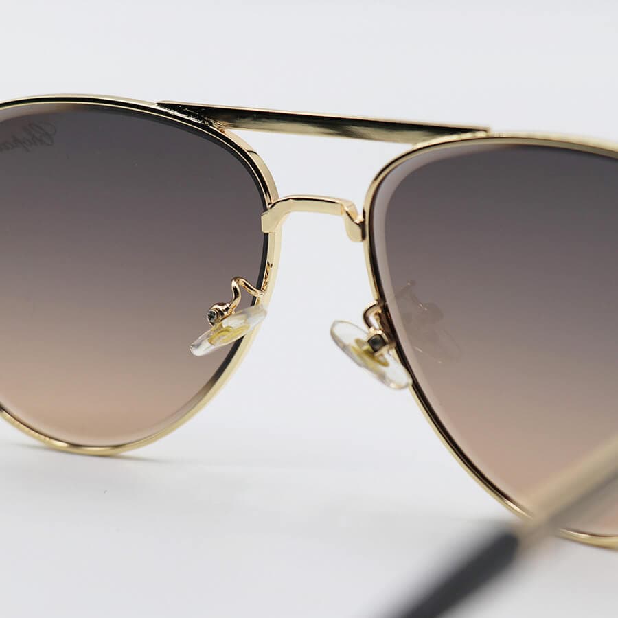 عینک آفتابی Chopard با فریم طلایی رنگ، شکل خلبانی و عدسی قهوهای سایه روشن مدل TJ72343 — تصویر ۸