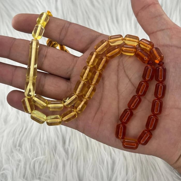 تسبیح پودر کهربا 33 دانه تراش کپسولی دو رنگ کدTA7 — تصویر ۲
