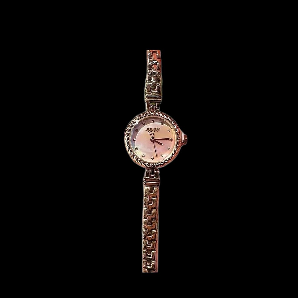 ساعت مچی زنانه جولیوس مدل JA-1453C اورجینال؛ رزگلد، قاب بافتدار (طرح طناب)، بند دستبندی و صفحه صدفی