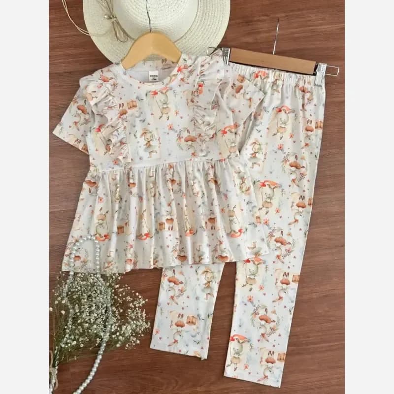 ست بلوز و شلوار راحتی دخترانه پنبه یک رو لاکرا مدل خرگوش کرم سایز 40 تا 60 — تصویر ۳