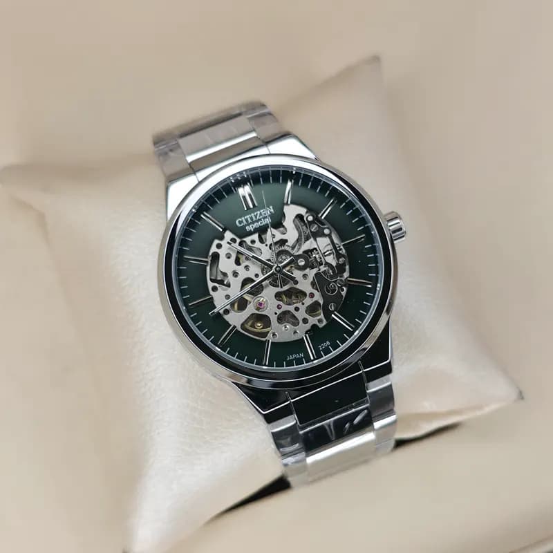 ساعت مچی اتومات عقربه ای مردانه سیتیزن اسپشیال نقره ای سبز مدل 2206G — تصویر ۷