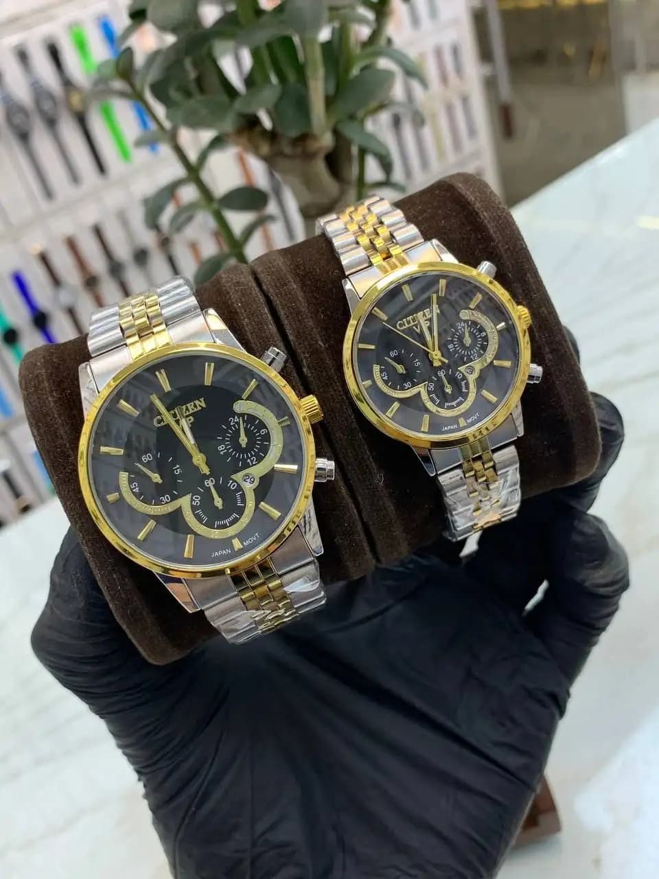 ساعت مچی زنانه یا مردانه مارک سیتیزن vip (بند نقره ای-طلایی صفحه مشکی) کد 4711 — تصویر ۲