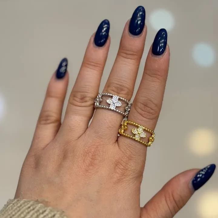 انگشتر زنانه طرح دولاین ونکلیف Vancleef در دو رنگ طلایی و نقره ای آبکاری نقره رنگ ثابت فری سایز Freesize کد zgy — تصویر ۲