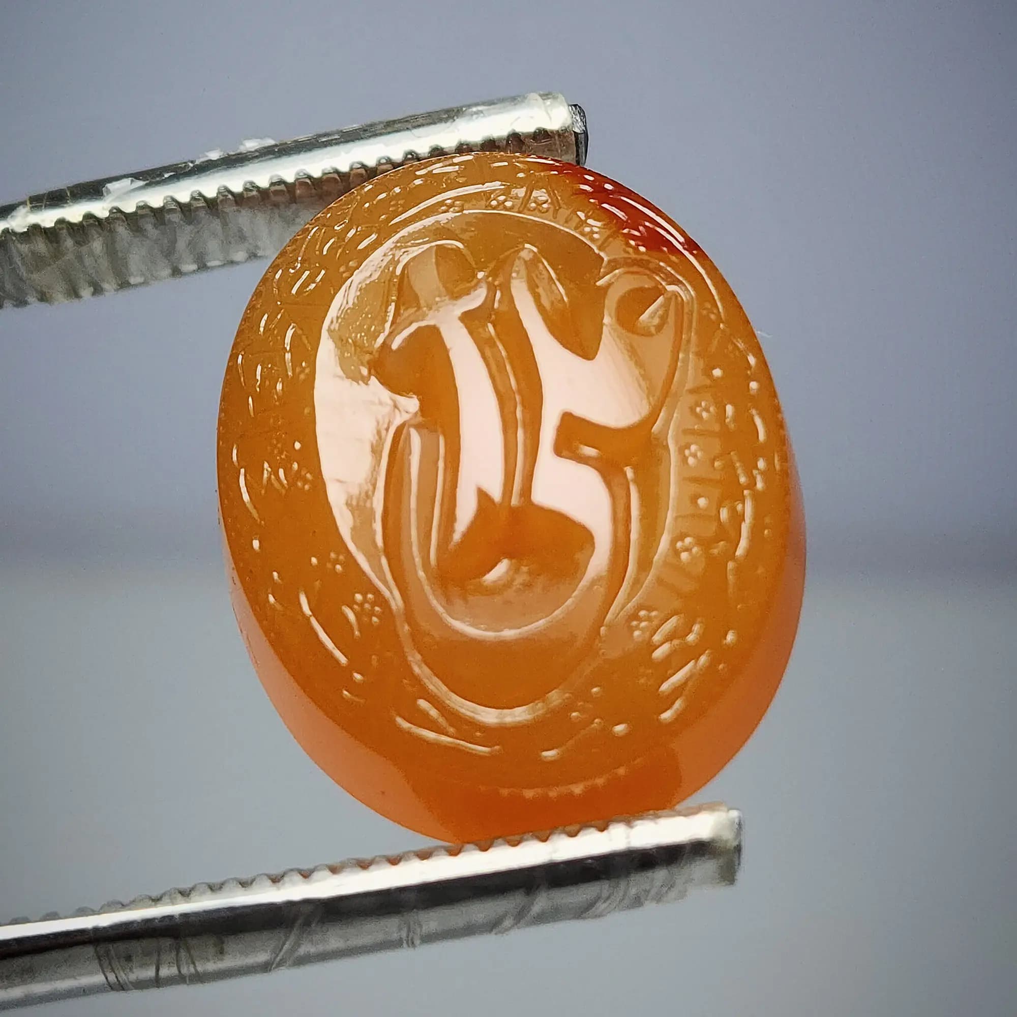 نگین عقیق پرتقالی یمنی حکاکی برجسته علی(ع) و ناد علی