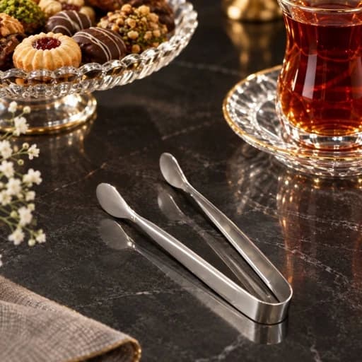 انبر-گیره شیرینی استیل hm(پس کرایه)