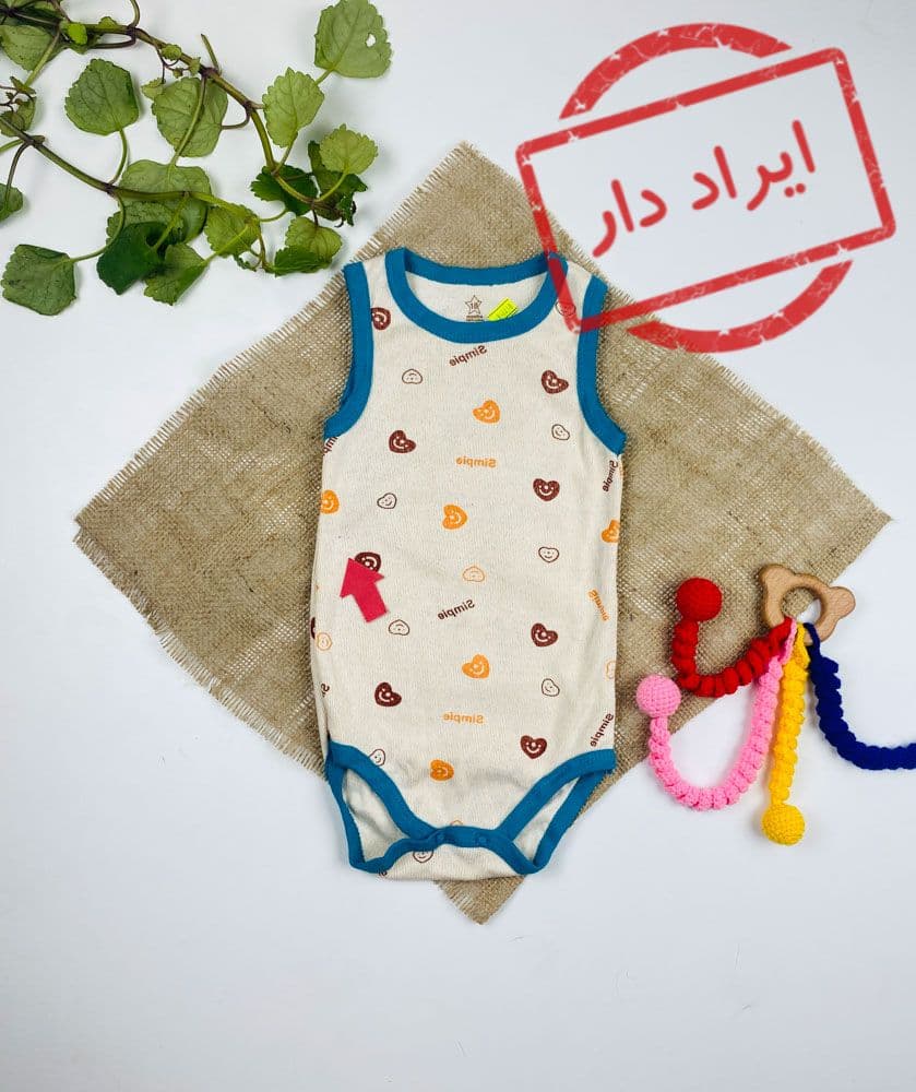 ایراد دار _ بادی نوزادی آستین تاپ طرح قلب قلبی تاپ حلقه ای یقه گرد کرمی رنگ – 18 ماه