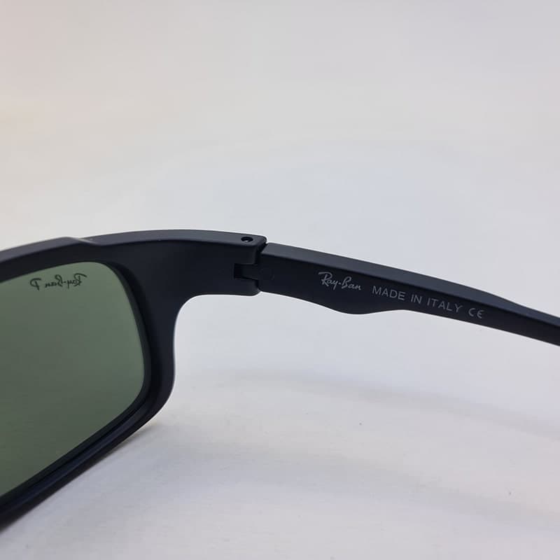 عینک آفتابی پلاریزه برند RAY-BAN با فریم مشکی رنگ و عدسی سبز مدل RB4364 — تصویر ۷