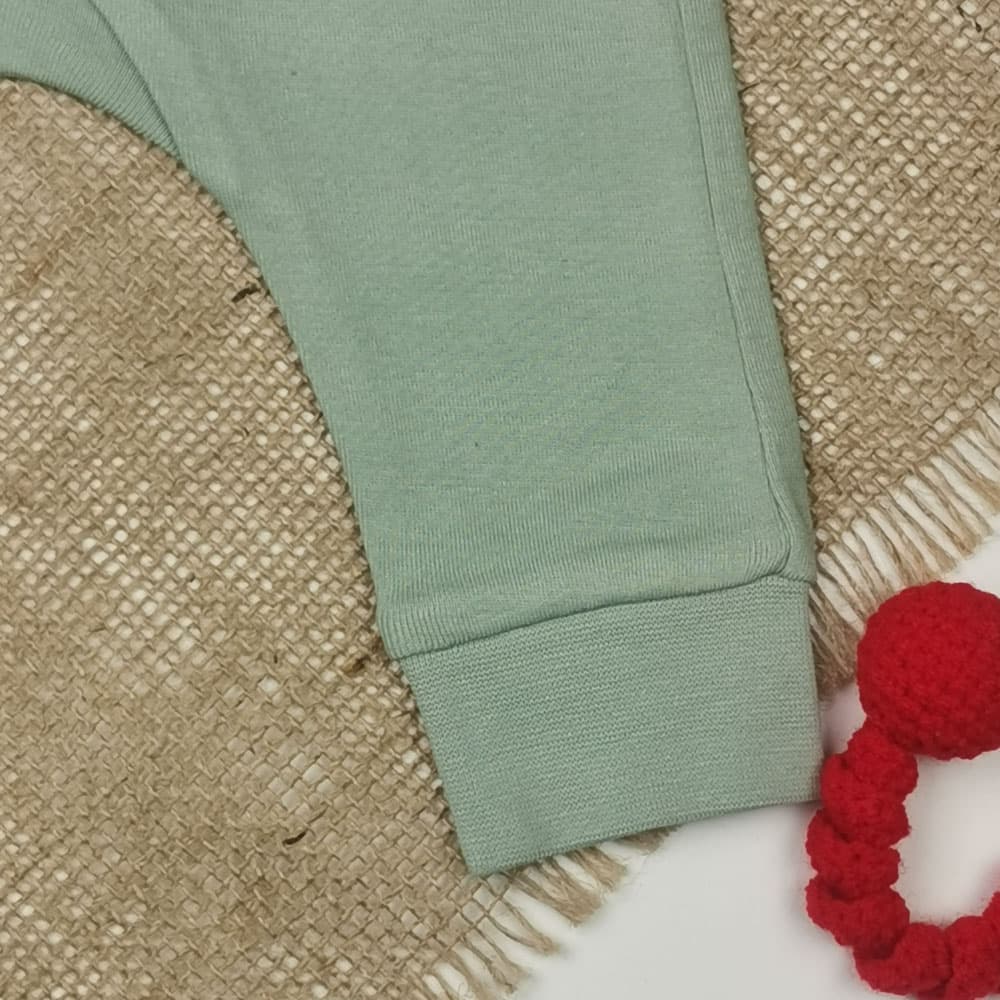 شلوار نوزادی اسلش برند h and m کمرکش سبز صدری رنگ — تصویر ۳