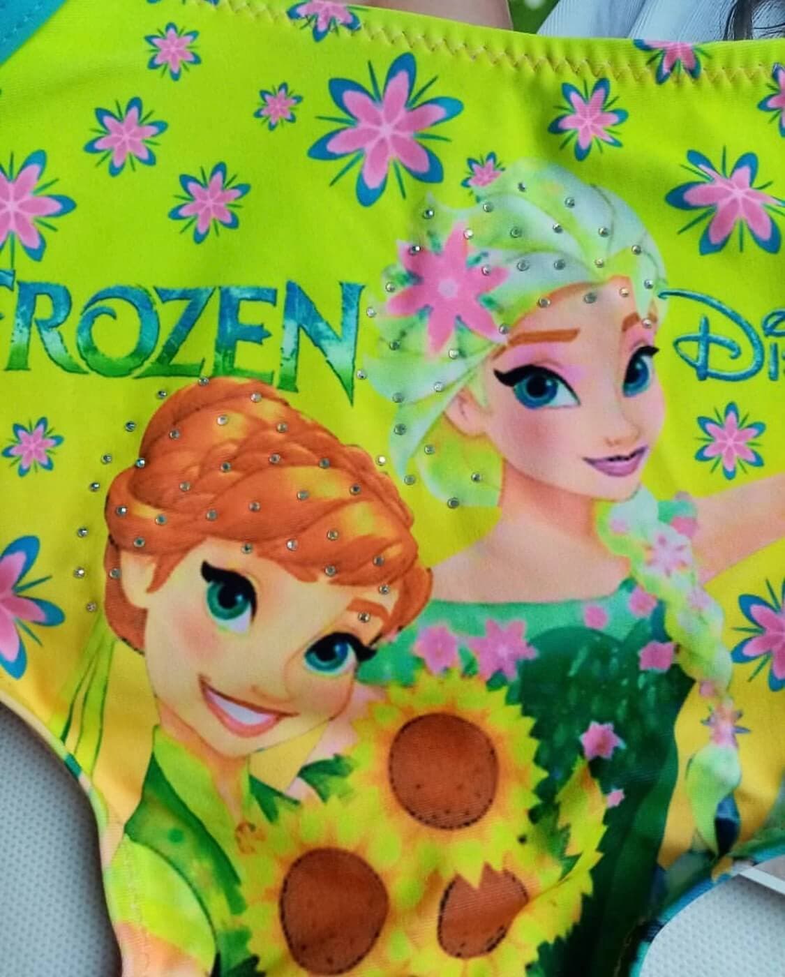 مایو بچگانه ( دخترانه ) اسلیپ سرهمی صورتی رنگ فانتزی طرح کارتون فروزن ( frozen ) پشت کمر باز مناسب کودکان ۴ تا ۵ سال و ۶ تا ۷ سال — تصویر ۳