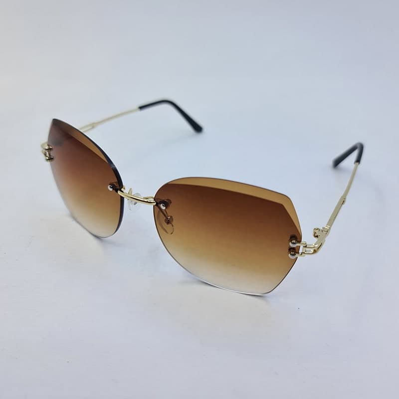 عینک آفتابی فریم لس پروانه ای با لنز قهوه ای و دسته طلایی مدل B300 — تصویر ۴