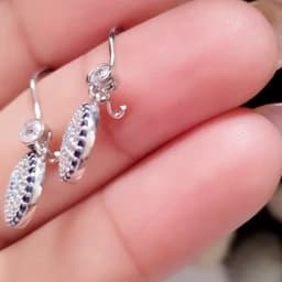 گوشواره نقره زنانه طرح چشم نظر عیار 925 روکش طلا سفید — تصویر ۲