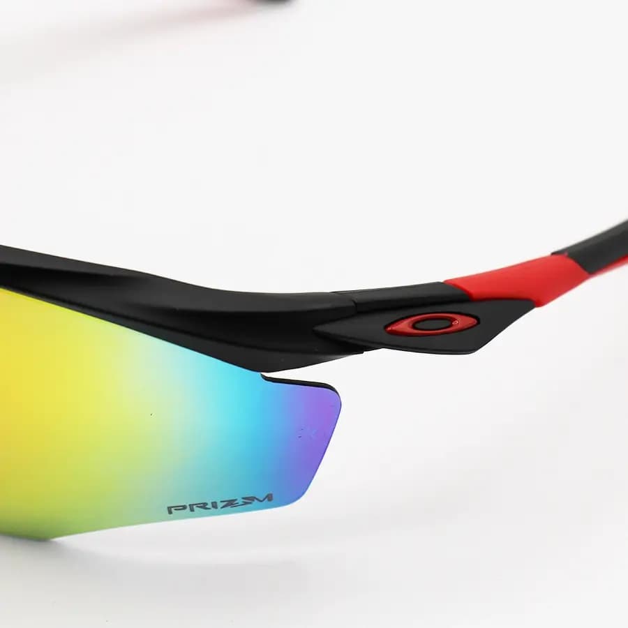 عینک ورزشی OAKLEY طرح M2 Frame با فریم مشکی مات، نیم فریم و لنز جیوهای و چند رنگ مدل OO9343 — تصویر ۶