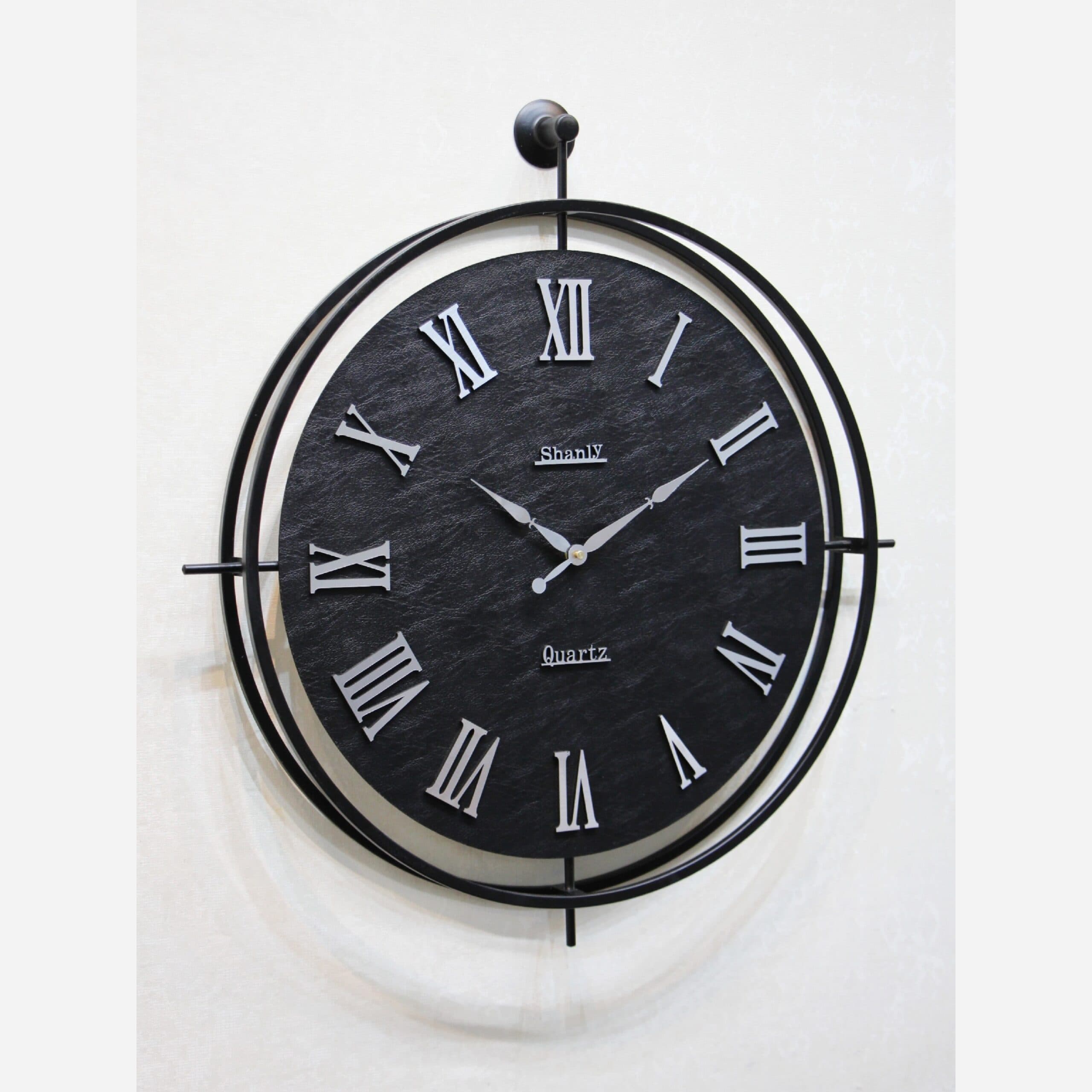 ساعت دیواری فلزی مدرن مشکی 6021 فیلبندشاپ مدل 841048 — تصویر ۲