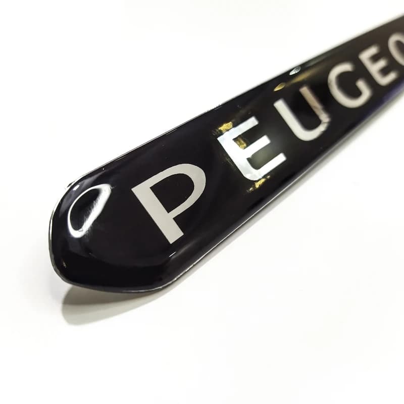 آرم ورد پلیت سپر جلو 206-207 ژله ای – نوشته peugeot — تصویر ۳