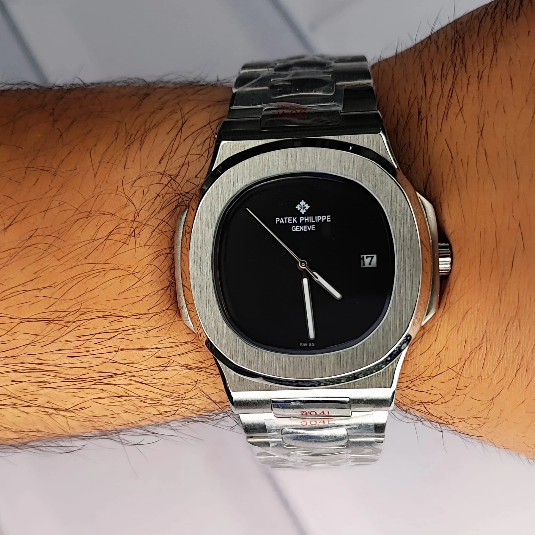 ساعت مچی مردانه پتک فیلیپ موتور ژاپن مدل ناتیلوس نقره ای مشکی (Patek Philippe Nautilus) — تصویر ۶