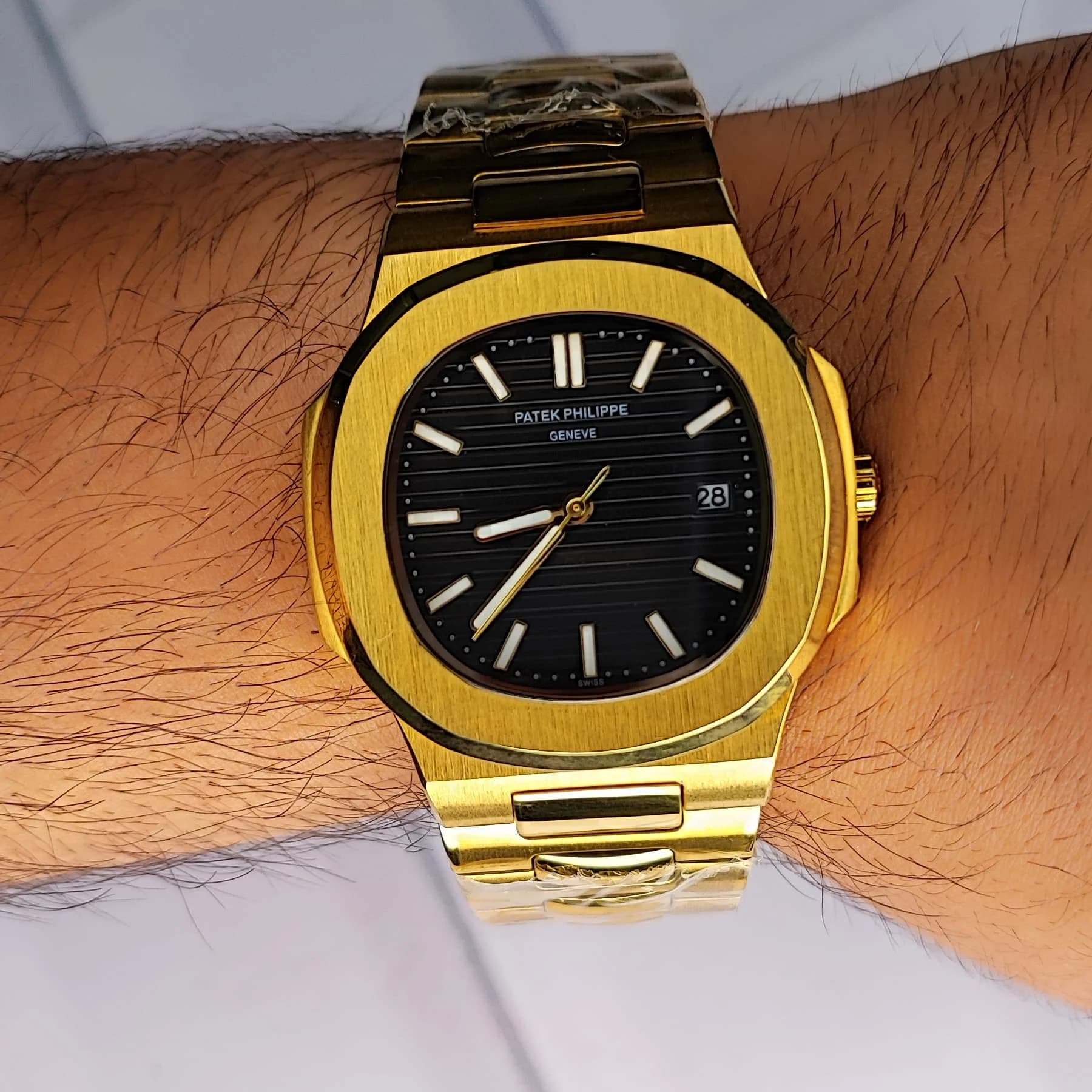 ساعت مچی مردانه پتک فیلیپ موتور ژاپن مدل ناتیلوس طلایی مشکی (Patek Philippe Nautilus) — تصویر ۴