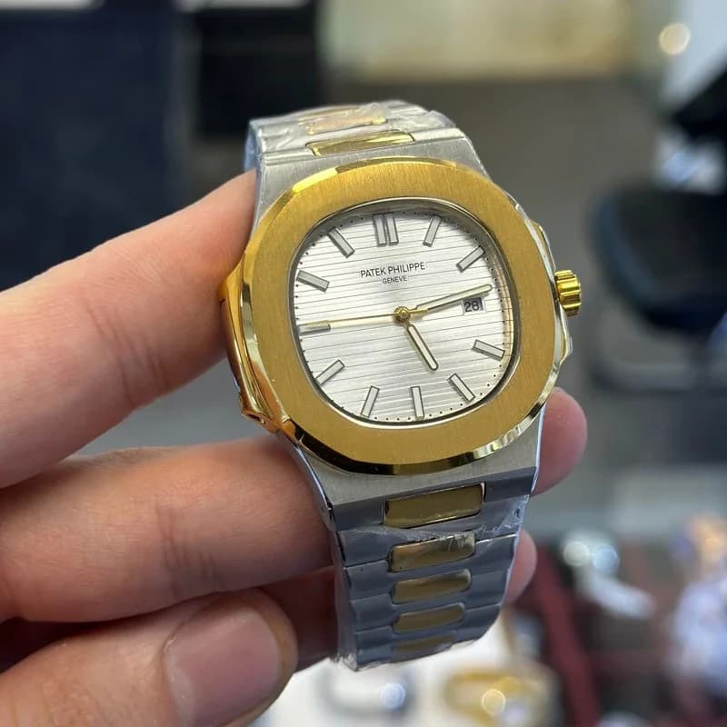 ساعت مچی مردانه پتک فیلیپ موتور ژاپن مدل ناتیلوس نقره ای طلایی (Patek Philippe Nautilus) — تصویر ۴