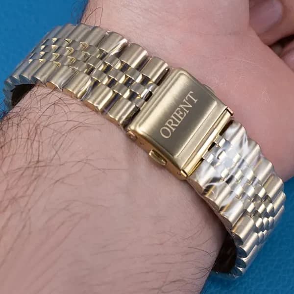 ساعت مچی عقربه ای مردانه اورینت سفید طلایی مدل 9361G — تصویر ۳