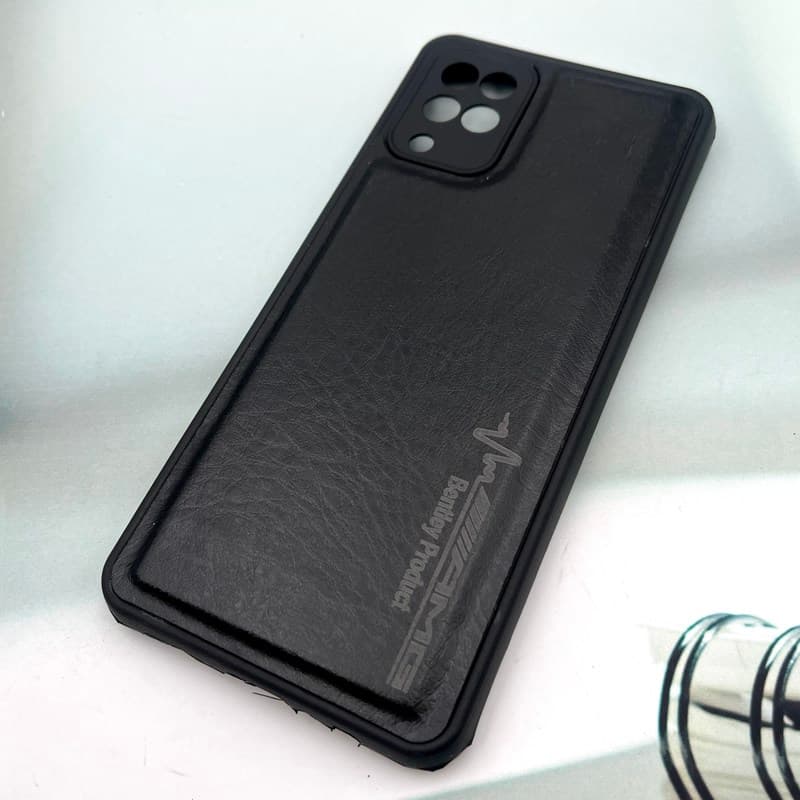 قاب گوشی Galaxy A12 / Galaxy M12 سامسونگ چرمی اورجینال کیس دور سیلیکونی AMG کلاسیک محافظ لنز دار مشکی کد 100312 — تصویر ۲